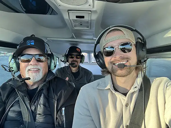 Dr. Kevin Osborne from Osborne Dentistry in Lebanon, OR flying in a plane with sons