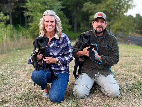 Dr. Kevin Osborne from Osborne Dentistry in Lebanon, OR with his wife and dogs