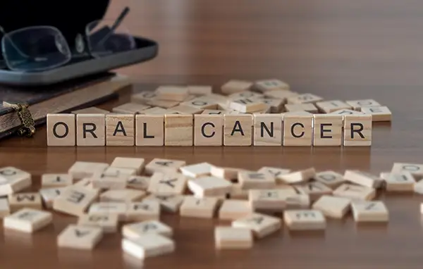 Oral cancer spelled out with game pieces at Osborne Dentistry in Lebanon, OR
